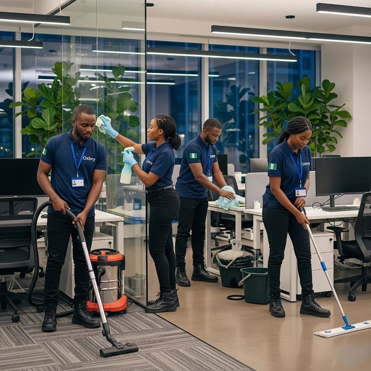 Nigerian cleaning team in office